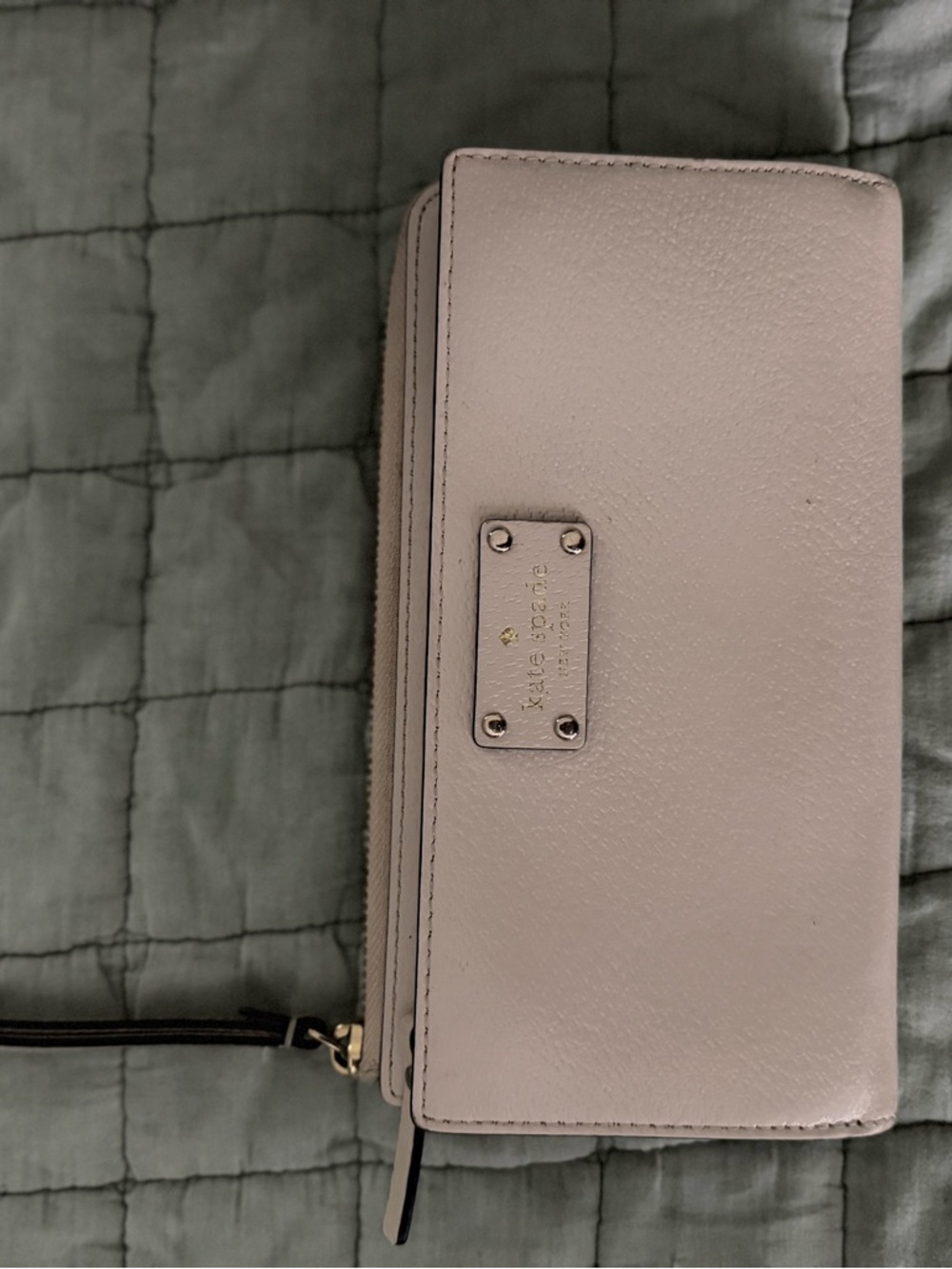 kate spade pale pink pebble leather wristlet clutch with logo plate